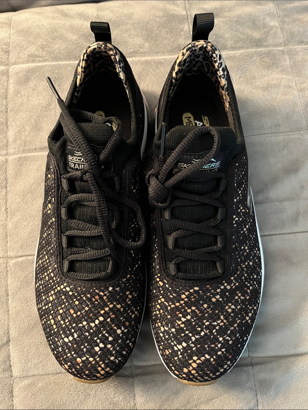 Skechers (Skechers-Air) Black and gold speckled slip on sneakers.  Size 7.5